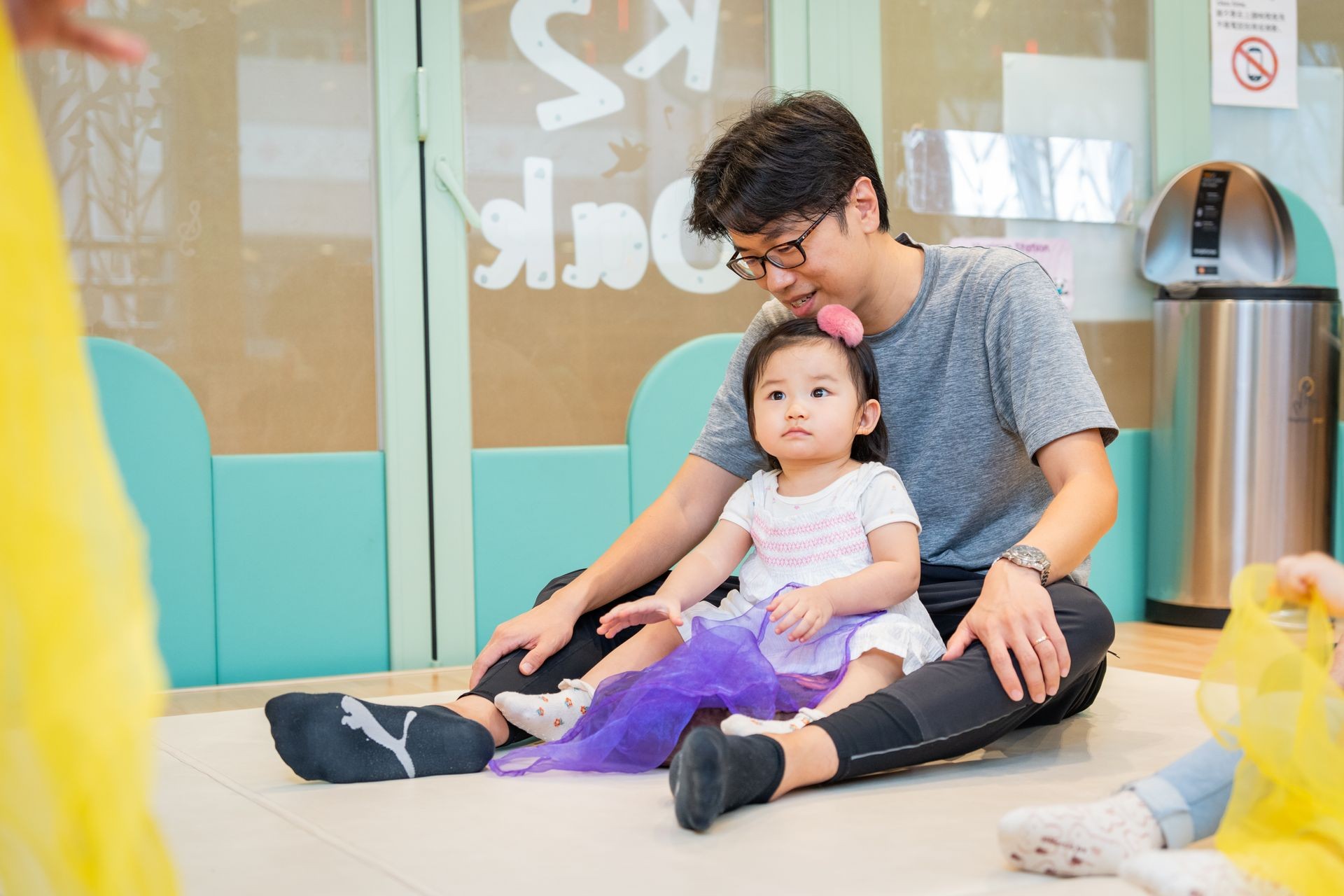 A father and daughter enjoying music play at Acorn Playgroup